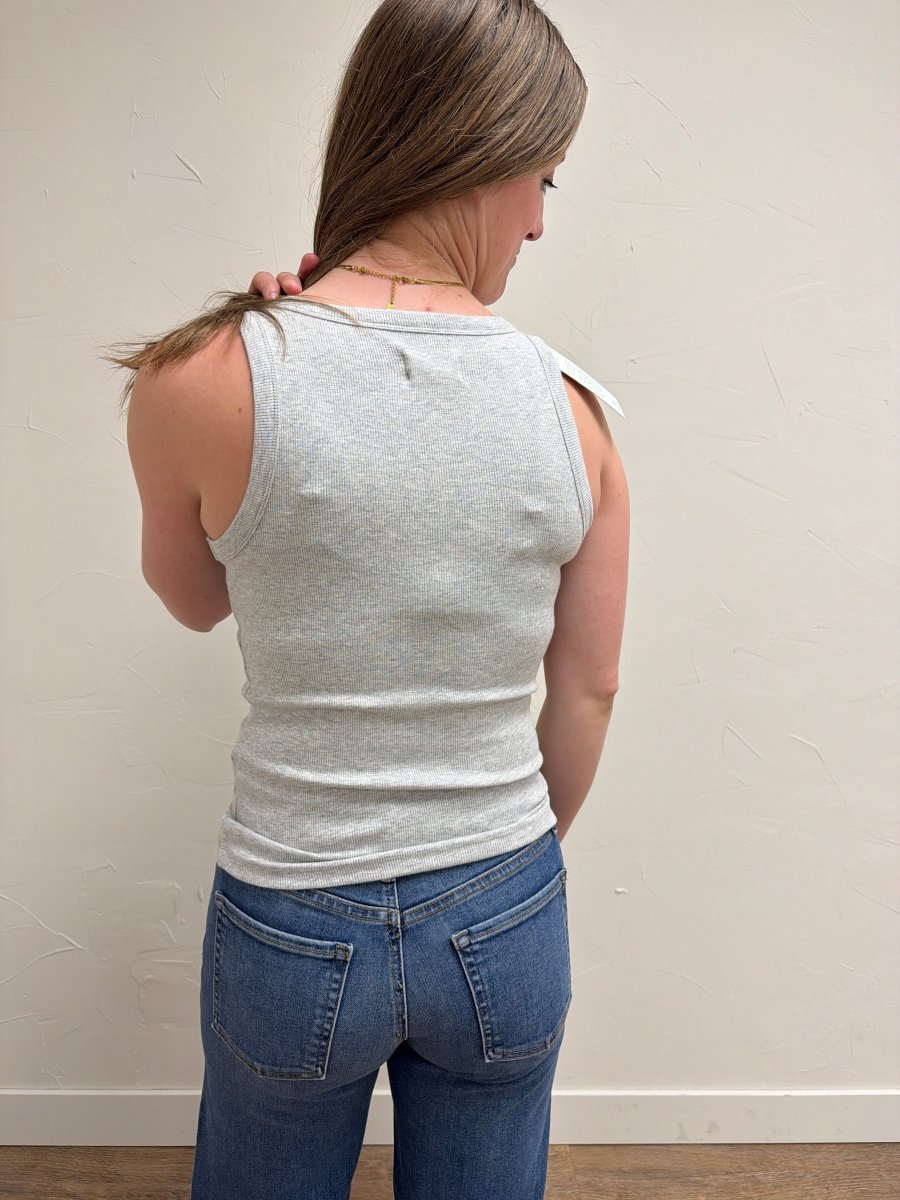 Back view of model wearing Edlin Tank showing fitted shape — Three Boutique