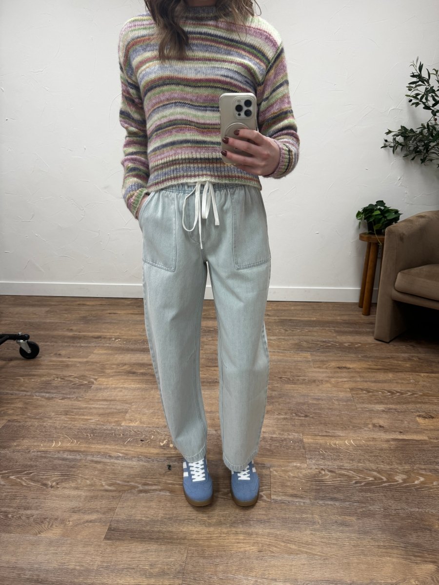 Front view of model wearing emerald wide leg pants showing high rise fit — Three:Twelve Boutique