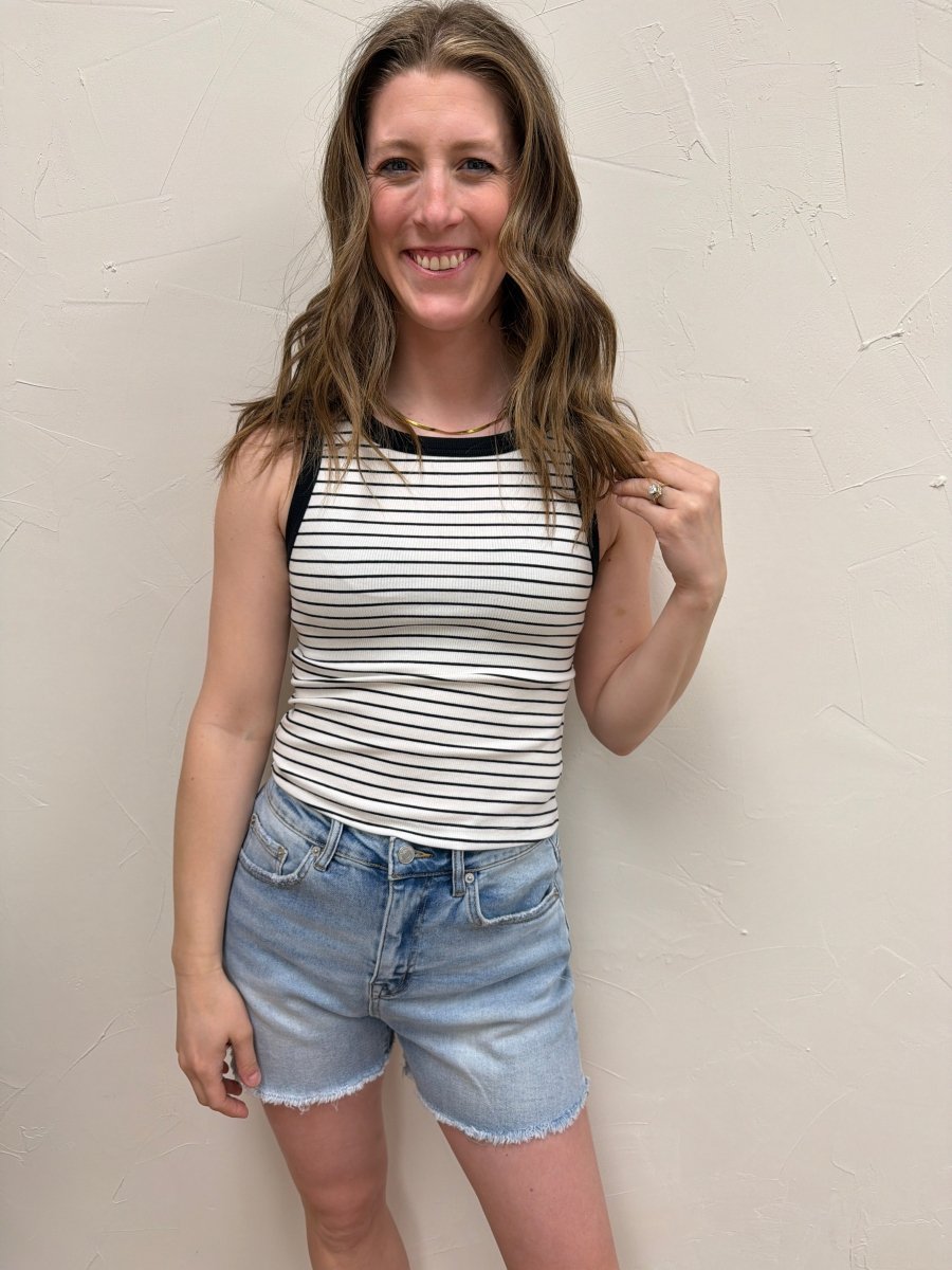 Lifestyle shot of model wearing Evie tank top styled casually with bottoms — Three:Twelve Boutique