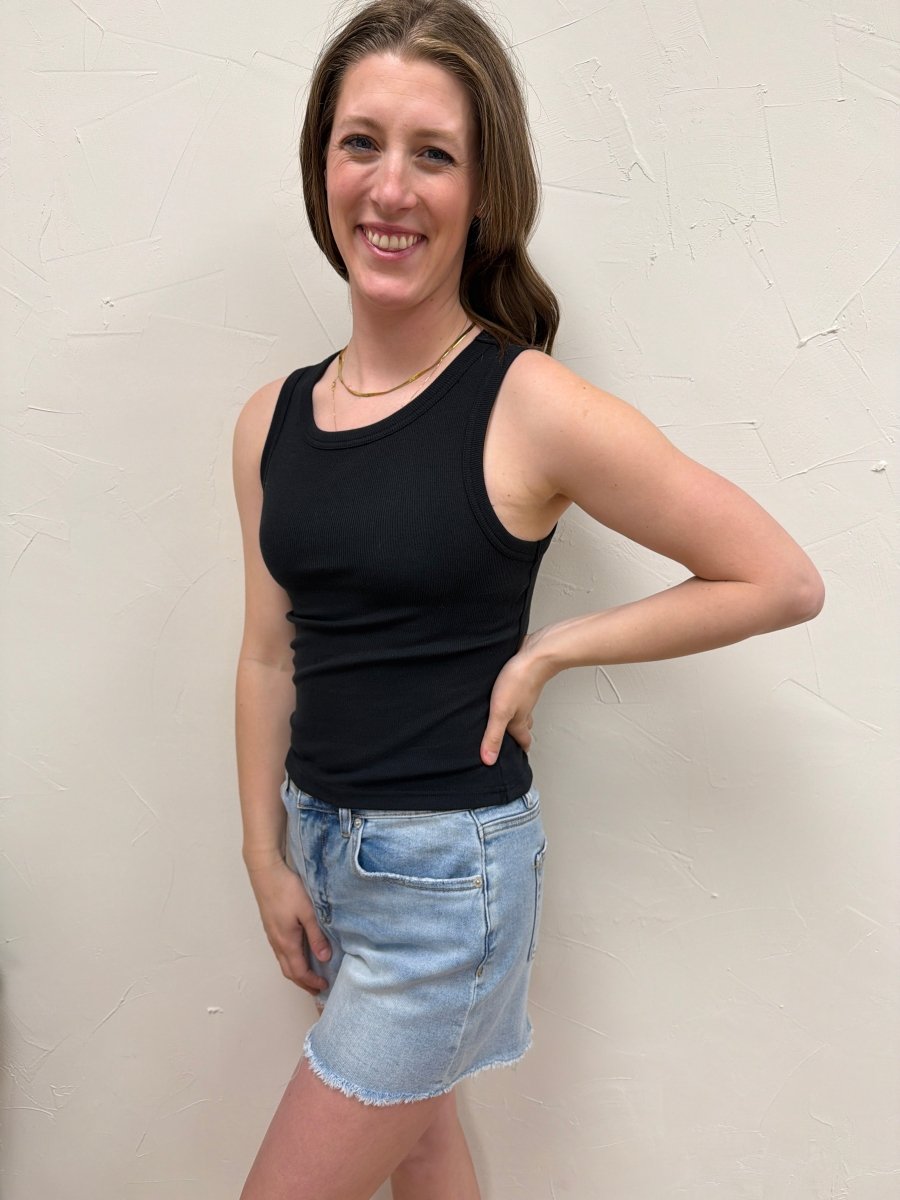 Side view of Evie tank top showing fitted structure and layering look — Three:Twelve Boutique