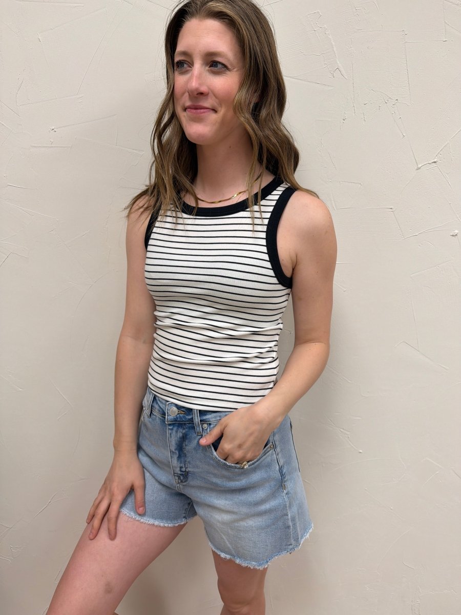 Lifestyle shot of model wearing Evie tank top styled casually with bottoms — Three:Twelve Boutique