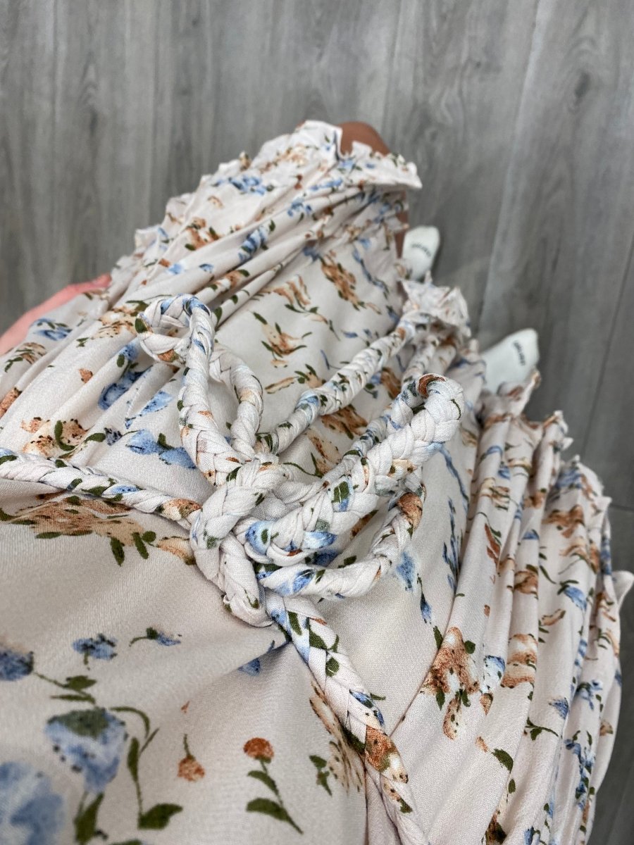 Close up of floral print fabric on long sleeve mini dress — Three:Twelve Boutique