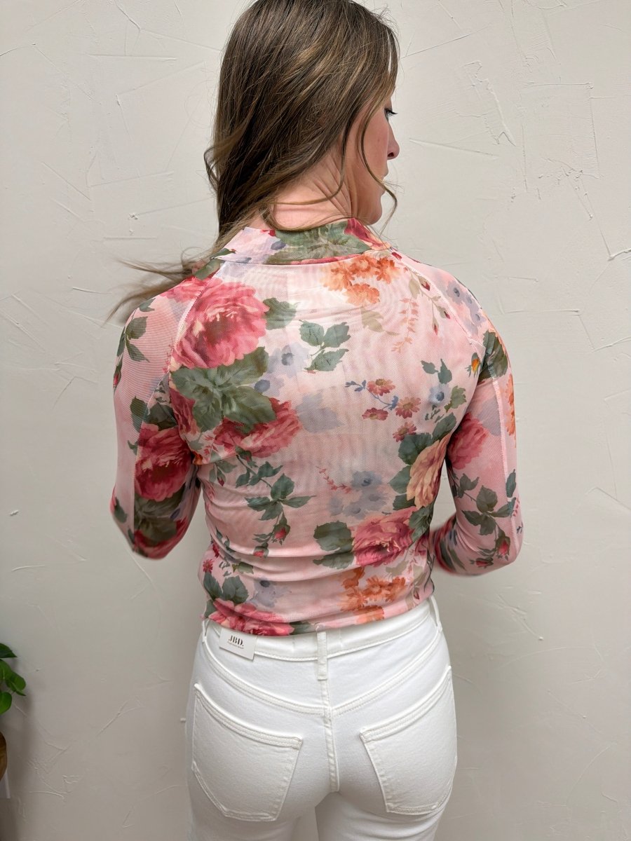 Back view of model wearing Floral Mesh Top highlighting mesh fabric and fit — Three:Twelve Boutique