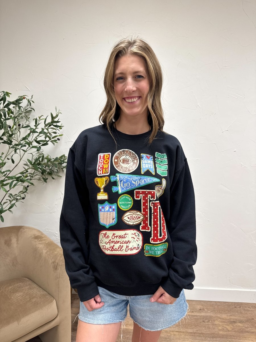 Front view of model wearing Football Varsity Patch sweatshirt with graphic varsity detail — Three:Twelve Boutique