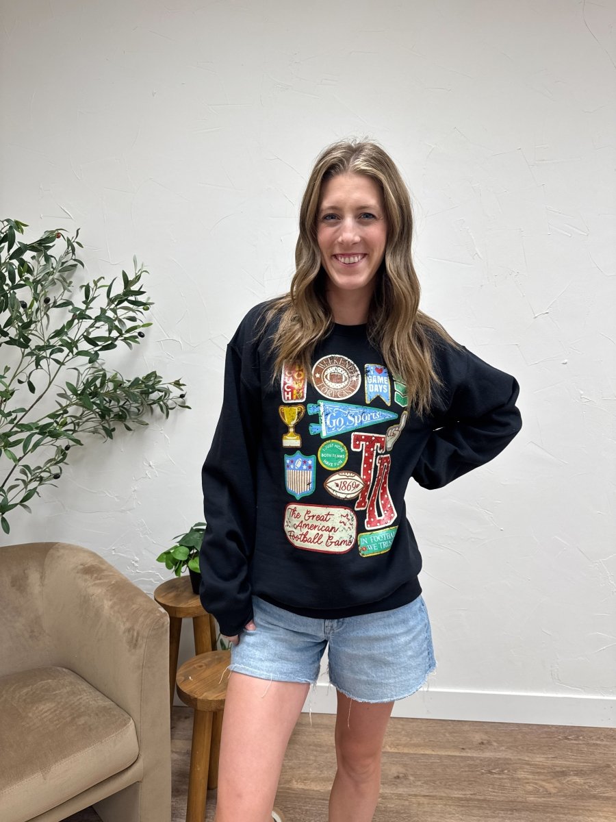 Front view of model wearing Football Varsity Patch sweatshirt with graphic varsity detail — Three:Twelve Boutique