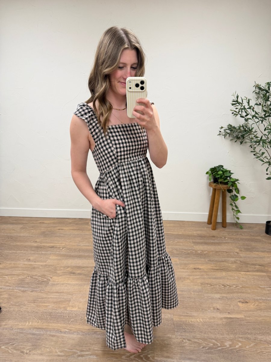 Side view of gingham maxi dress showing flowy skirt and sleeve detail — Three:Twelve Boutique
