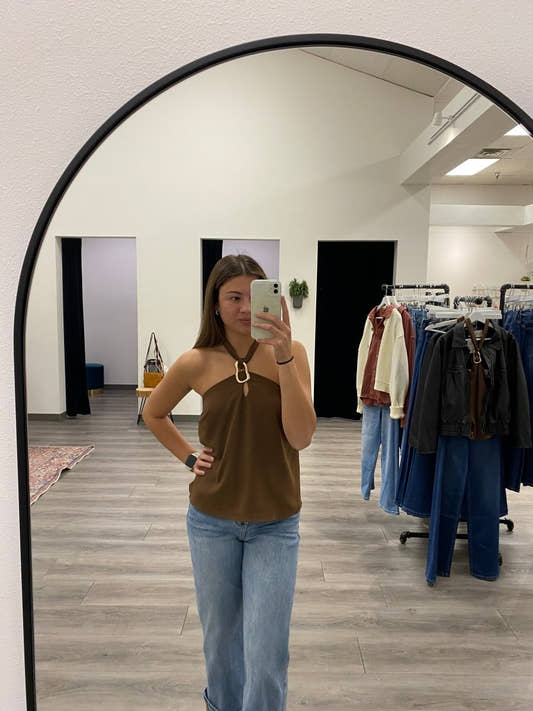 Front view of model wearing gold ring halter neck top with open neckline detail — Three:Twelve Boutique