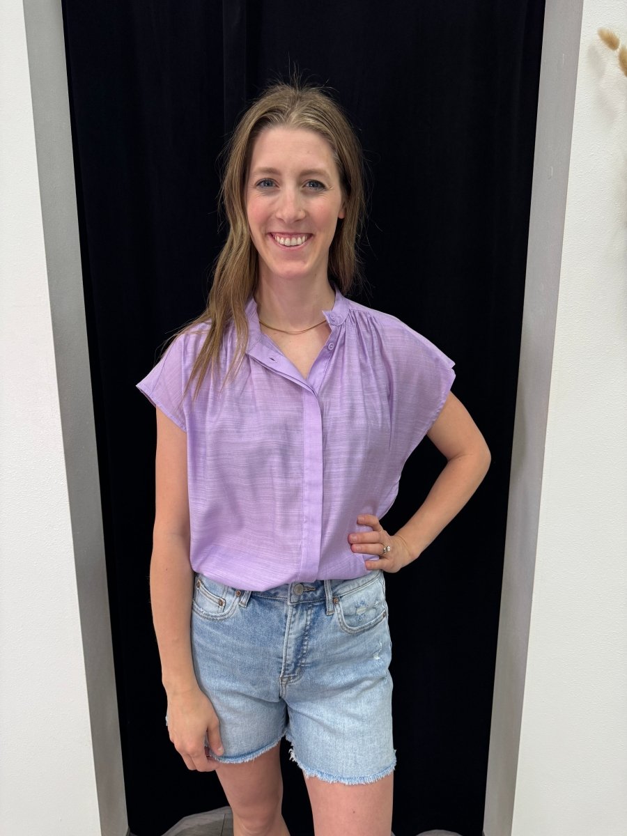 Front view of model wearing Henley neckline button down top — Three:Twelve Boutique