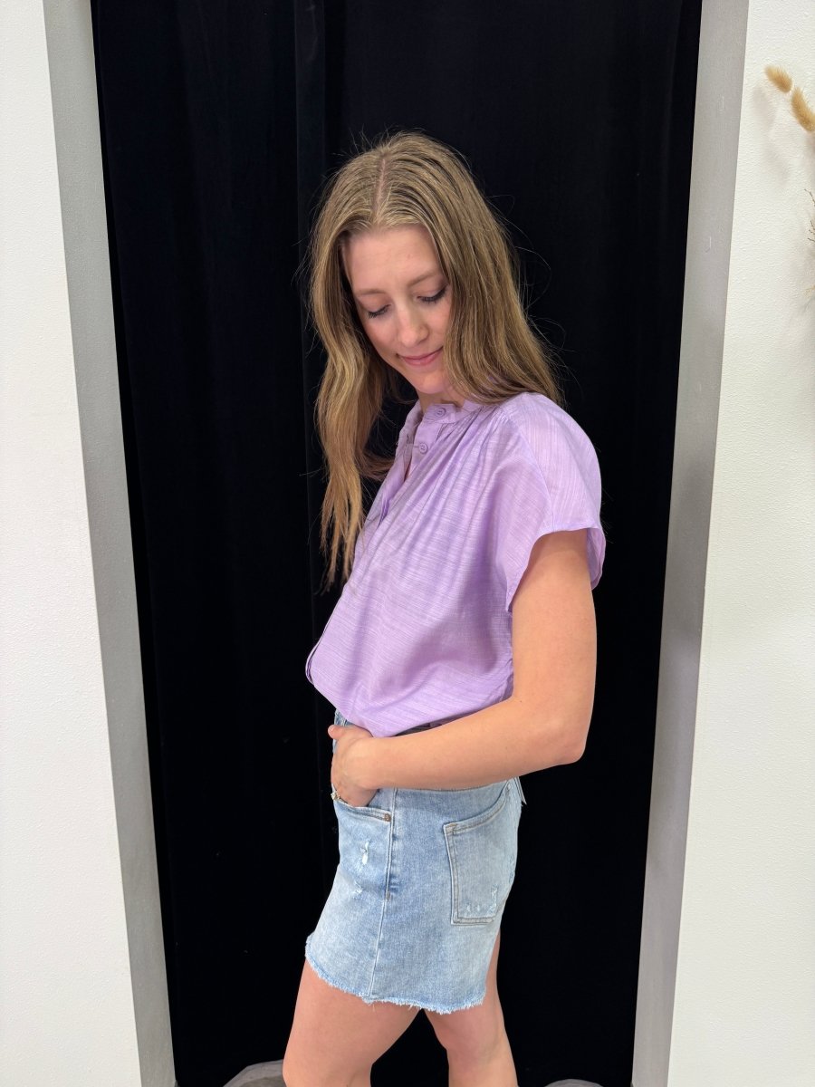 Side view of model wearing Henley top showing silhouette — Three:Twelve Boutique