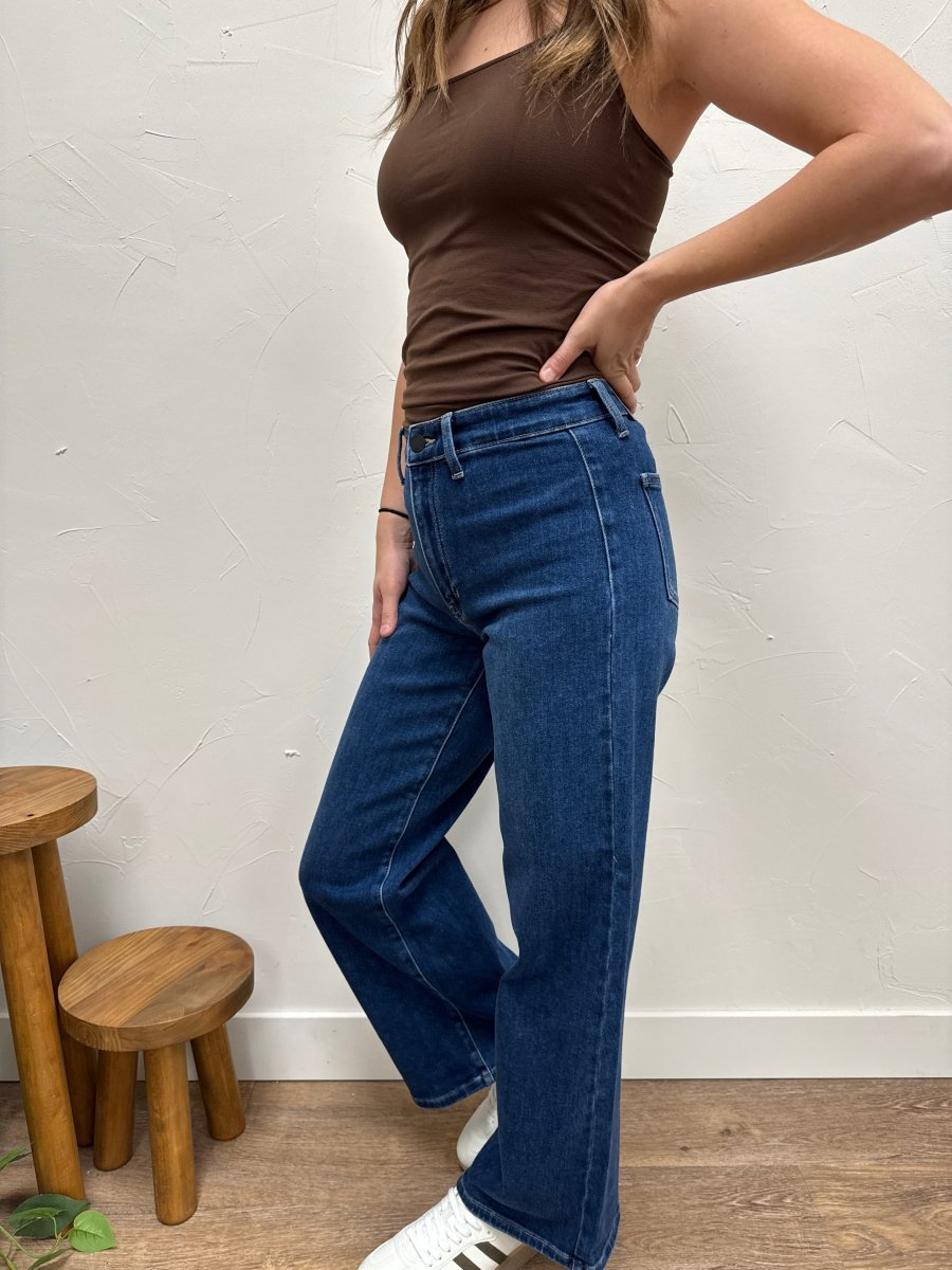 Side angle view of Hidden Pocket Trouser Denim showing high rise waist and flow — Three:Twelve Boutique