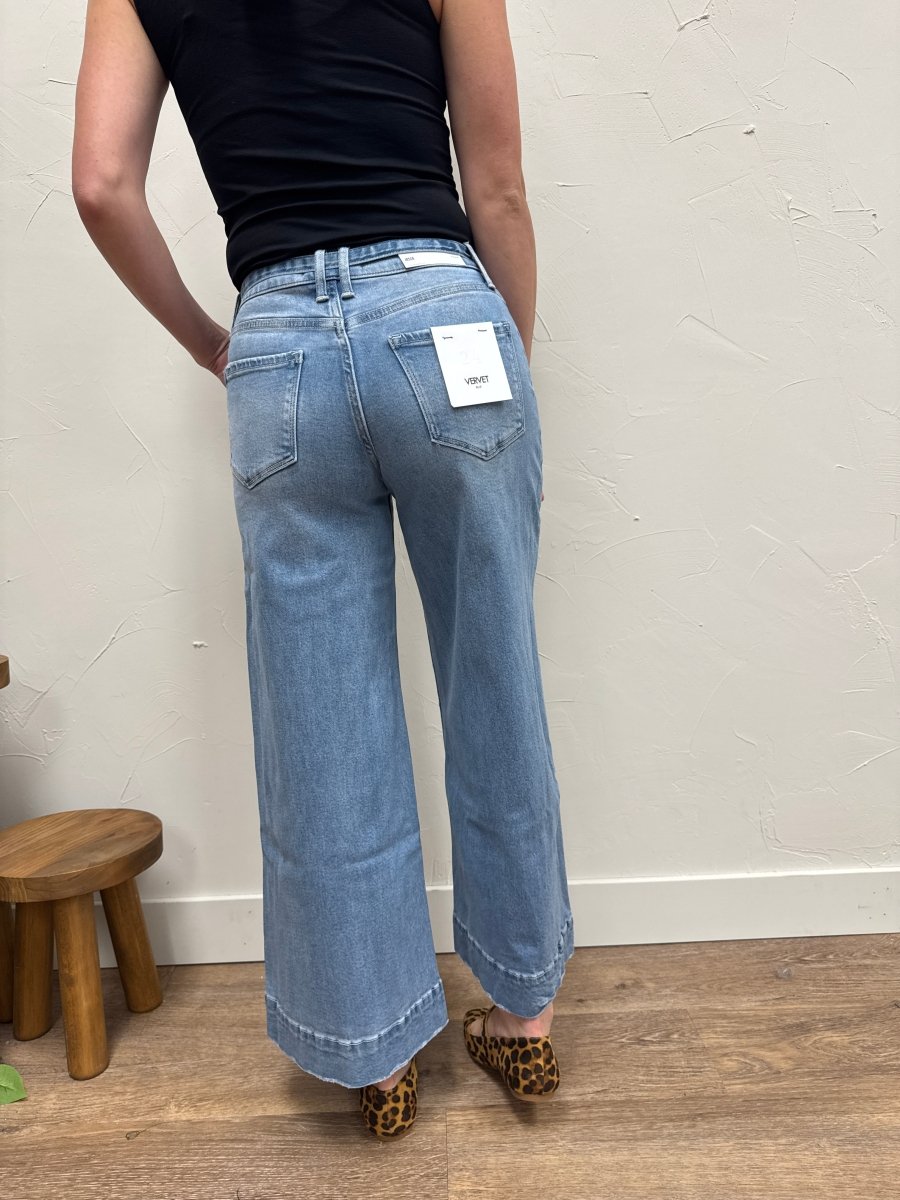 Back view of high rise palazzo pants showing wide leg silhouette — Three:Twelve Boutique