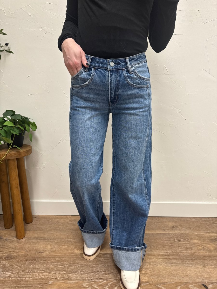 Close up of denim fabric and panel stitching detail on jeans — Three:Twelve Boutique