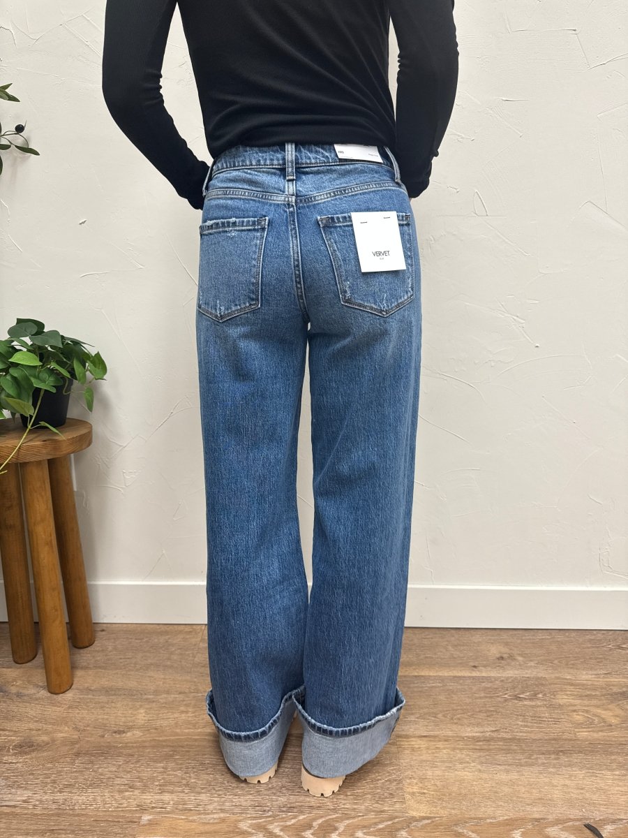 Back view of cuffed wide panel jeans highlighting pocket and fit — Three:Twelve Boutique