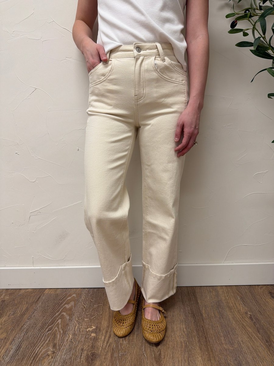 Lifestyle shot of model wearing High Rise Cuffed Wide Leg Vervet Denim jeans paired with casual top — Three:Twelve Boutique