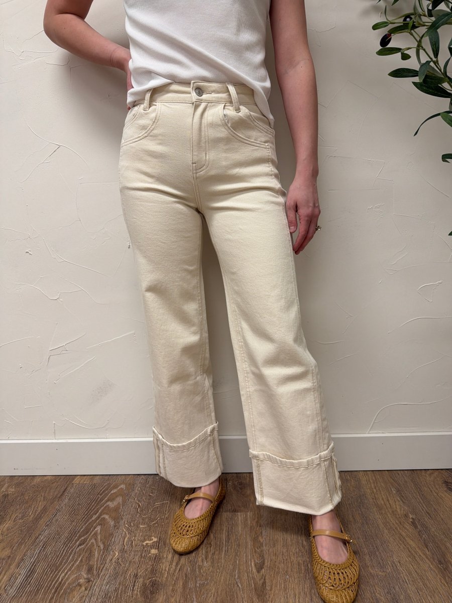 Lifestyle shot of model wearing High Rise Cuffed Wide Leg Vervet Denim jeans paired with casual top — Three:Twelve Boutique