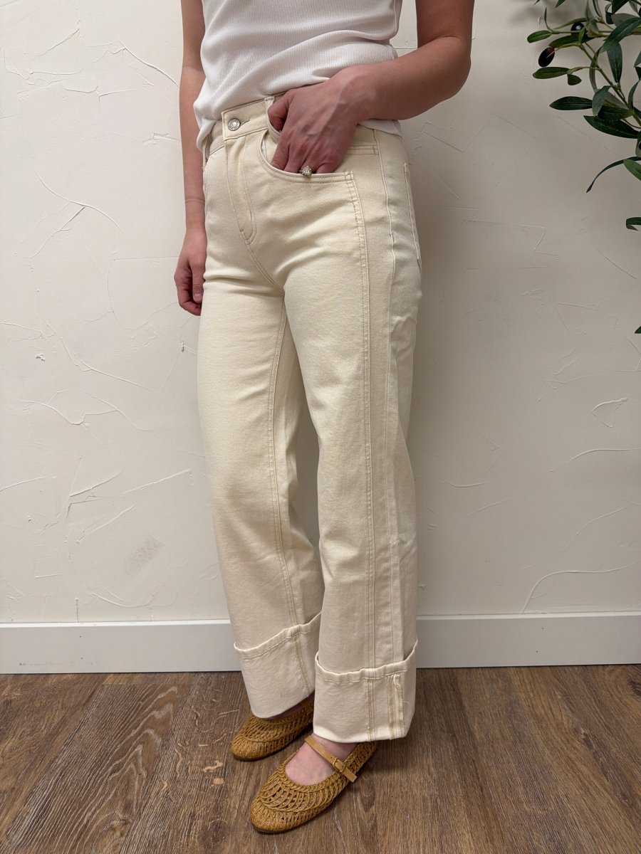 Lifestyle shot of model wearing High Rise Cuffed Wide Leg Vervet Denim jeans paired with casual top — Three:Twelve Boutique