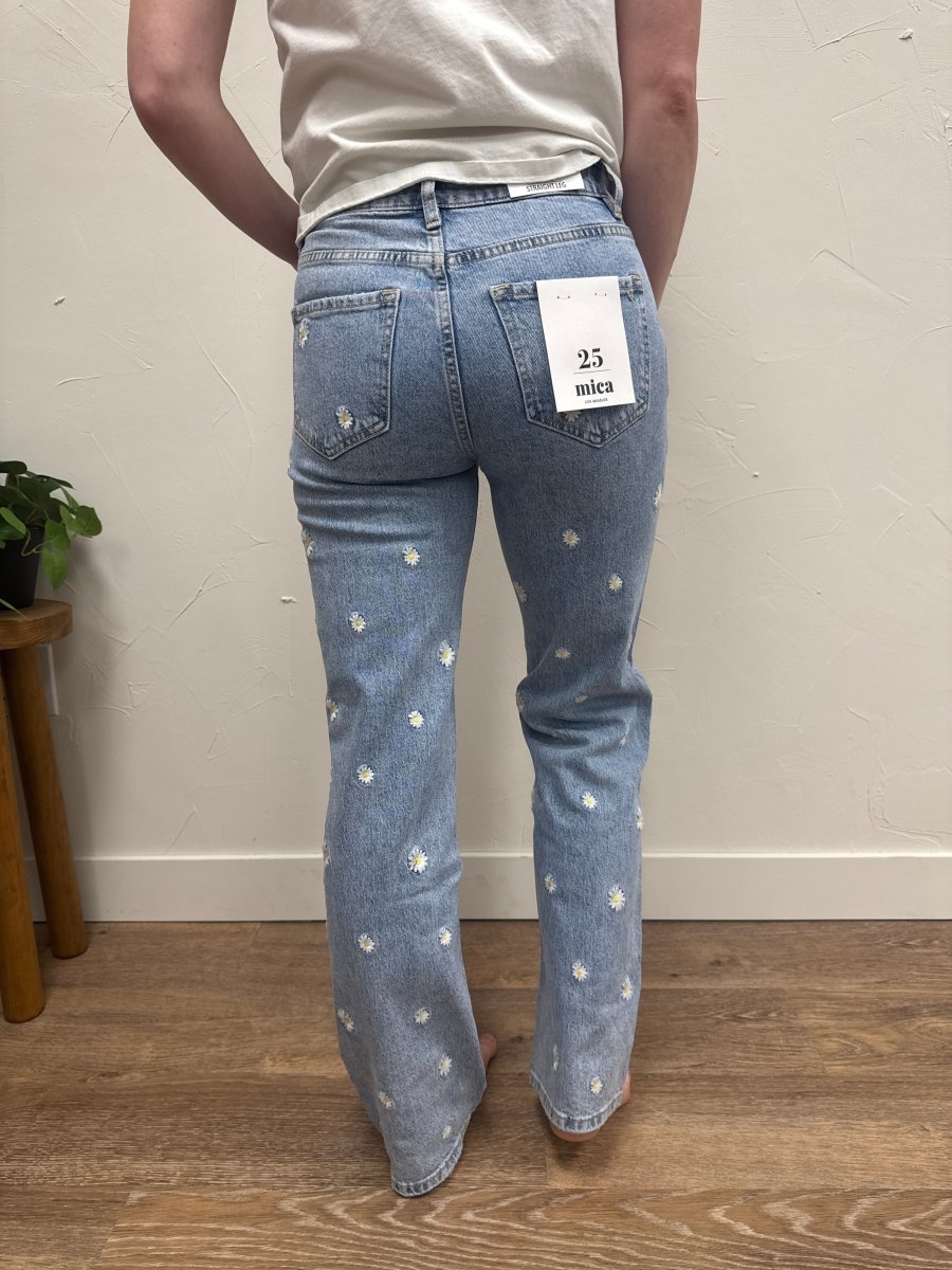 Back view of embroidered straight leg jeans on model showing fit and shape — Three:Twelve Boutique
