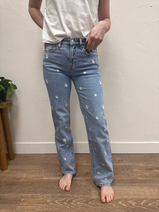 Front view of high rise straight leg jeans with embroidery detail on model — Three:Twelve Boutique