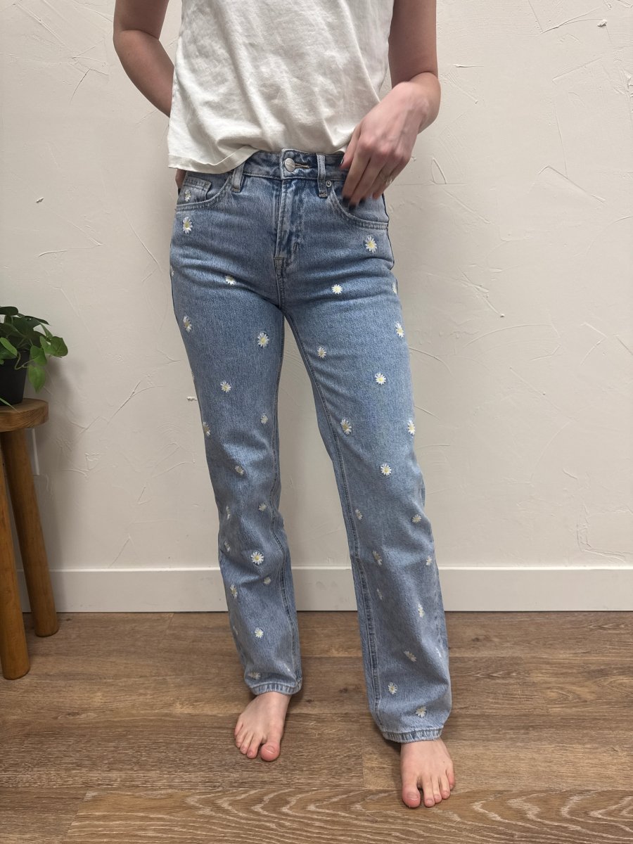 Front view of high rise straight leg jeans with embroidery detail on model — Three:Twelve Boutique
