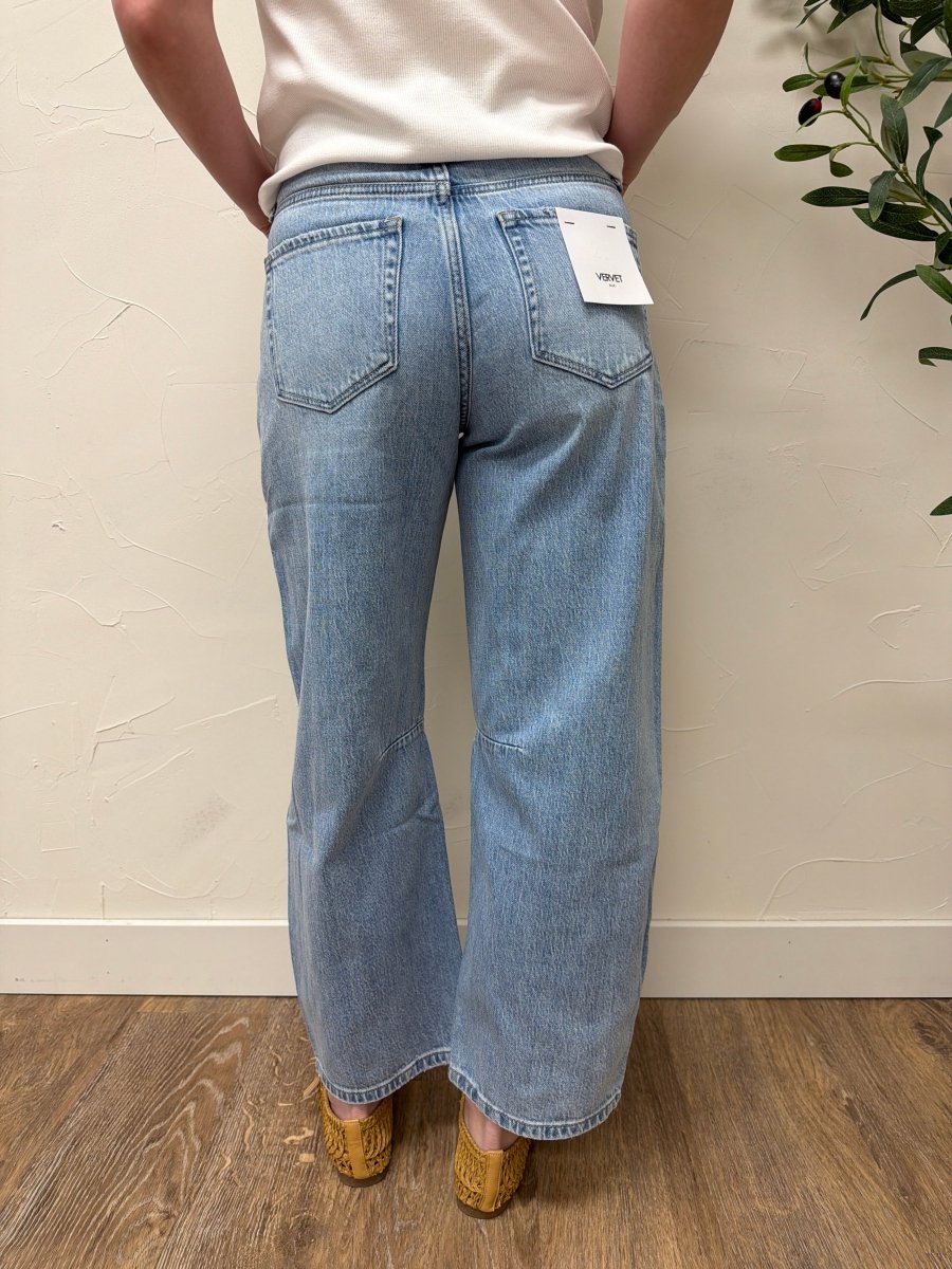 Back view of wide barrel Vervet denim on model highlighting fit and pockets — Three:Twelve Boutique