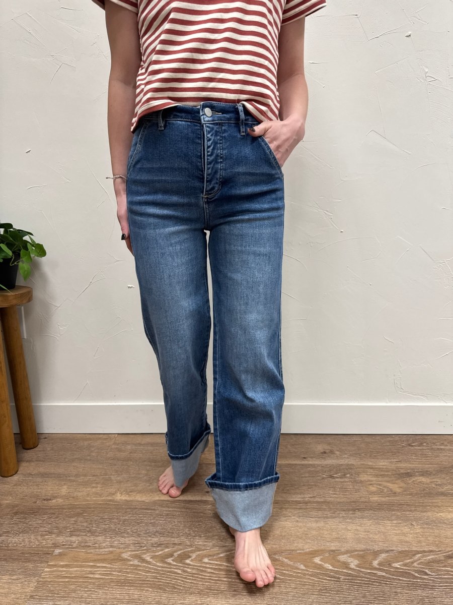 Lifestyle shot of model styling high rise cuffed jeans with casual outfit — Three:Twelve Boutique
