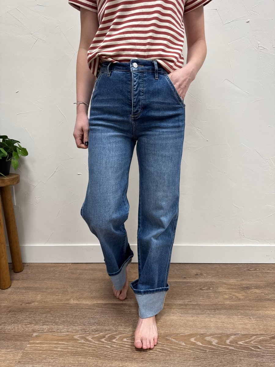 Lifestyle shot of model styling high rise cuffed jeans with casual outfit — Three:Twelve Boutique