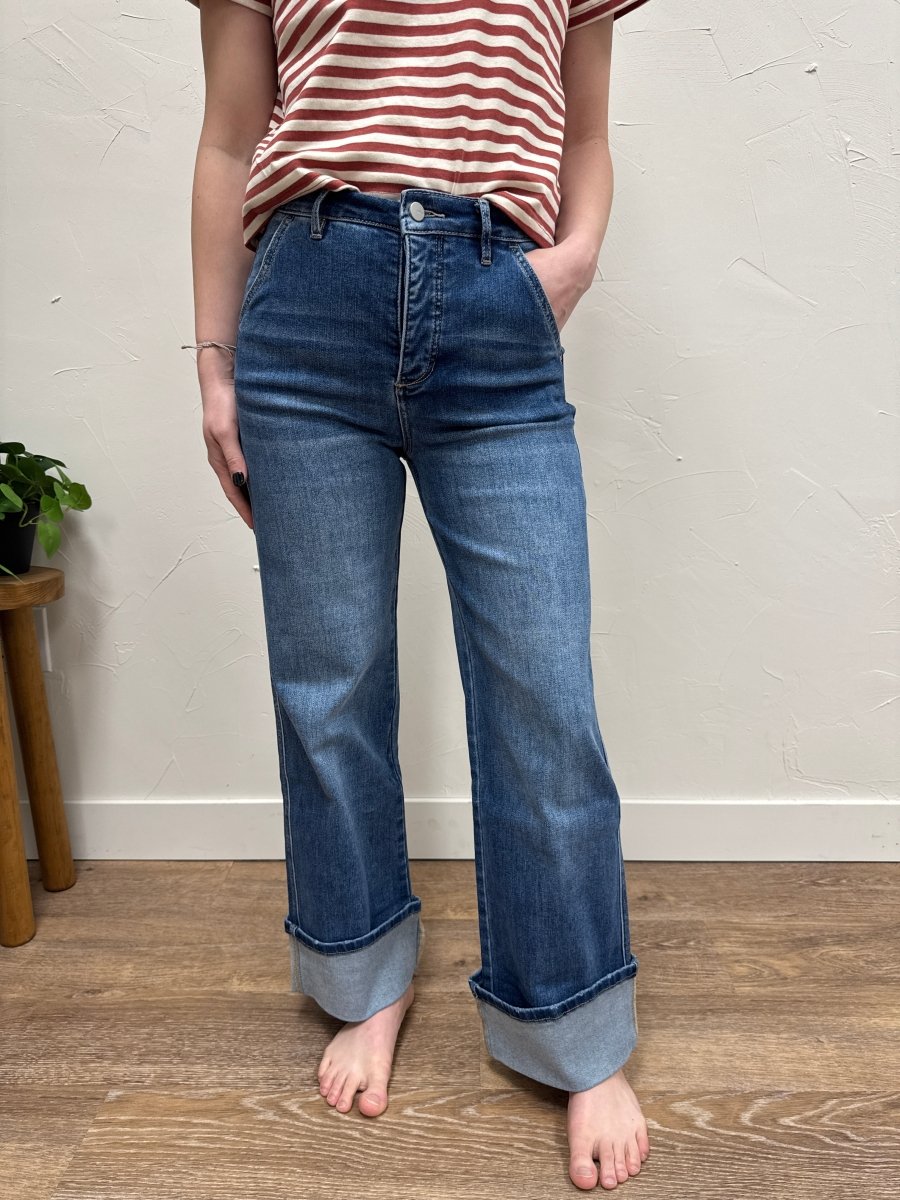 Front view of model wearing high rise wide cuffed leg jeans showing full length fit — Three:Twelve Boutique