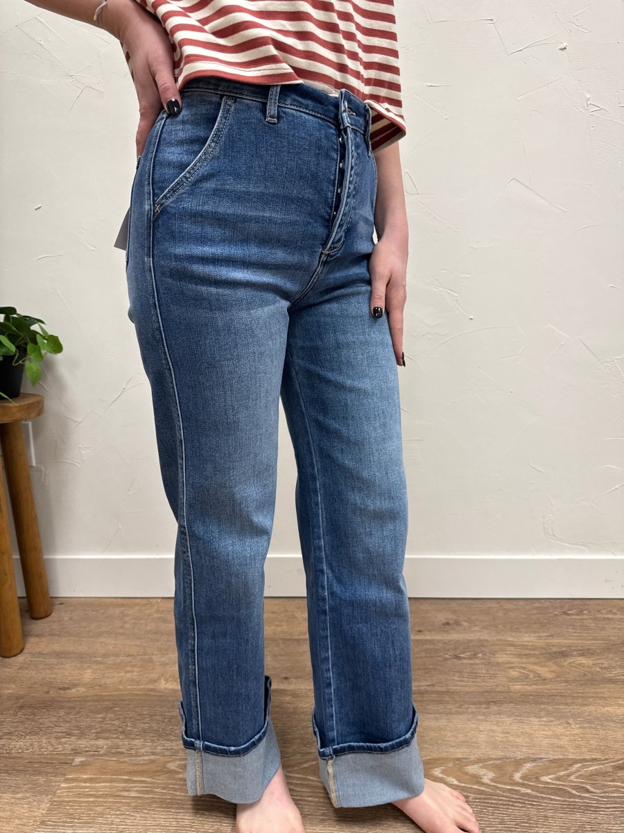 Lifestyle shot of model styling high rise cuffed jeans with casual outfit — Three:Twelve Boutique