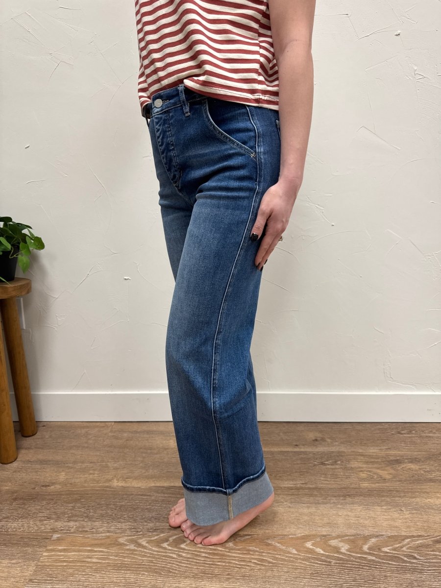 Side view of high rise wide leg jeans showing silhouette and cuffed bottom — Three:Twelve Boutique