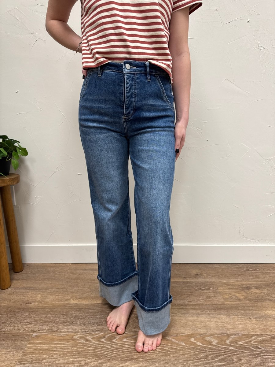 Lifestyle shot of model styling high rise cuffed jeans with casual outfit — Three:Twelve Boutique