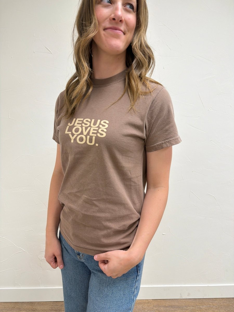 Close up of Jesus Loves Me graphic print detail on Comfort Colors tee — Three Boutique