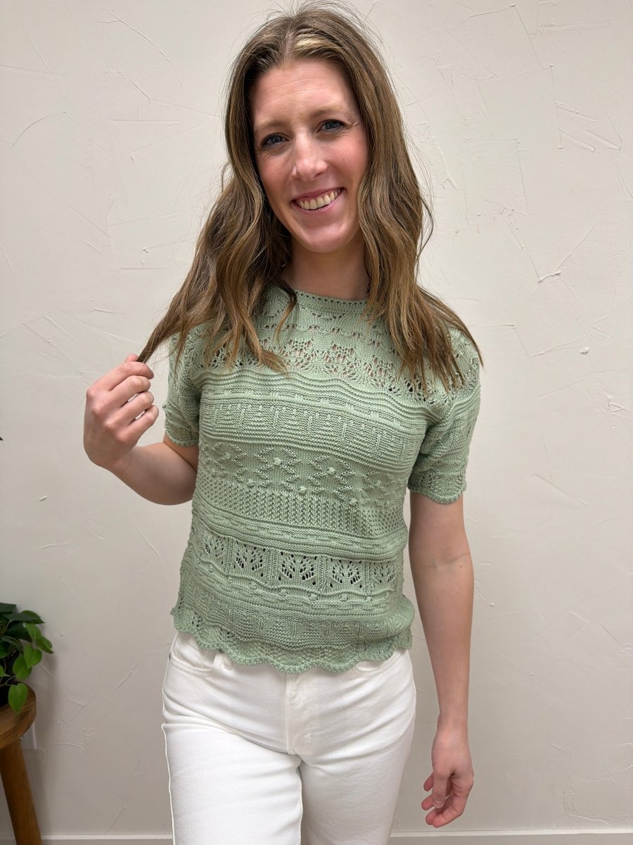 Front view of model wearing knit short sleeve top showing relaxed everyday fit — Three:Twelve Boutique
