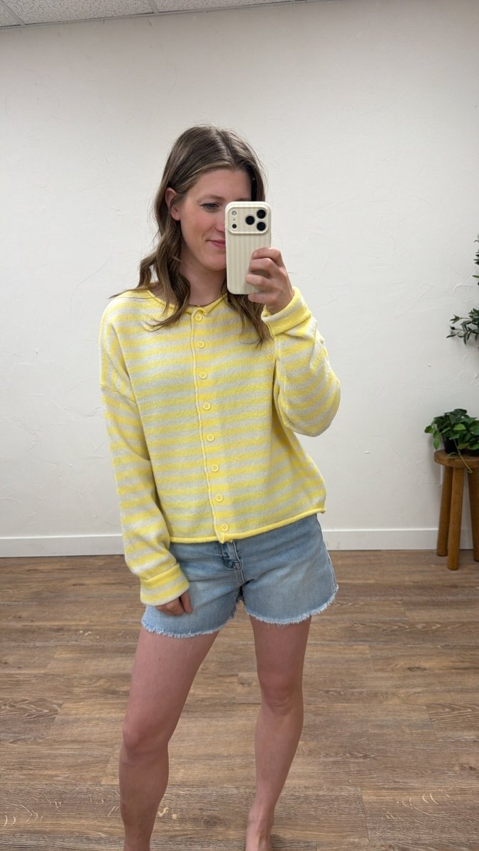 Lifestyle shot of model wearing striped cardigan styled with casual outfit — Three:Twelve Boutique