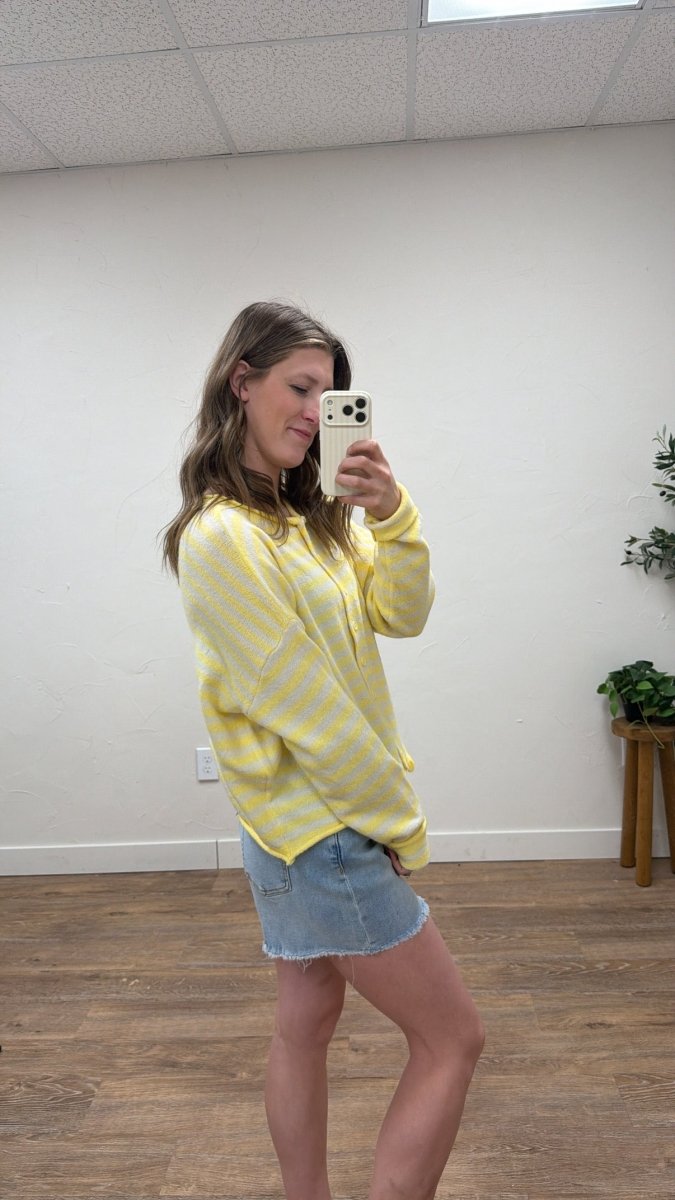 Side view of striped sweater cardigan showing drape and fit — Three:Twelve Boutique