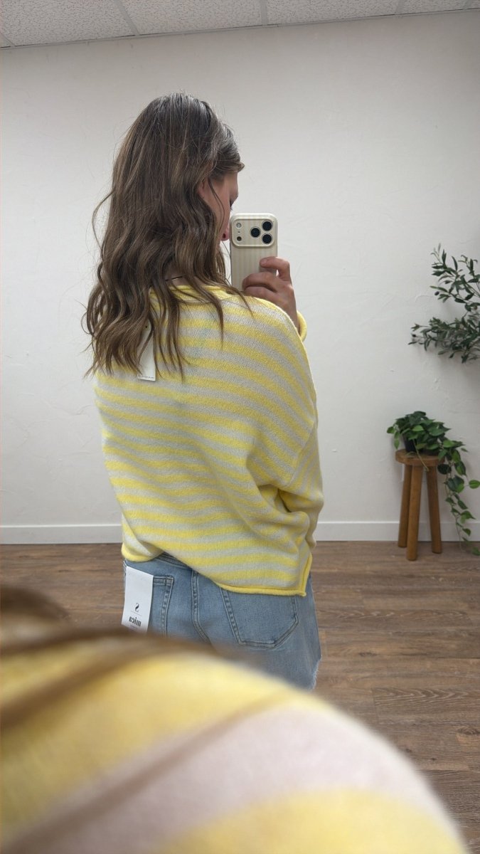 Back view of model wearing striped cardigan highlighting overall silhouette — Three:Twelve Boutique