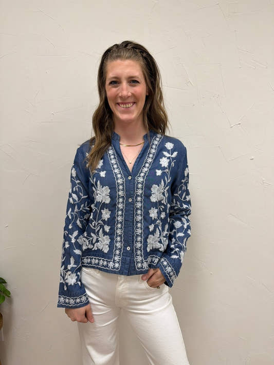 Front view of model wearing Long Sleeve Embroidered Denim Button Down Top