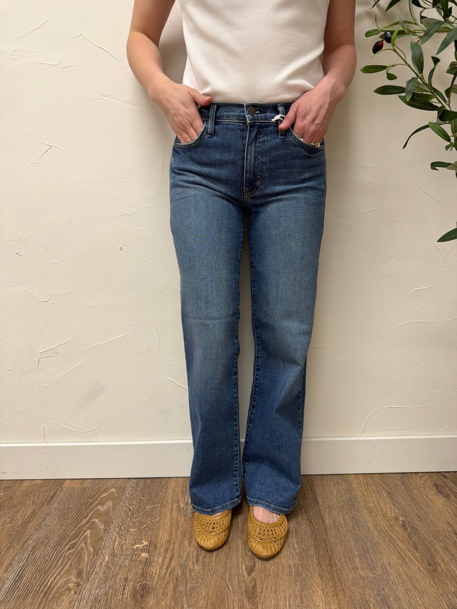 Lifestyle shot of model styled casually wearing Loose Straight Fit Jeans with a simple top — Three:Twelve Boutique