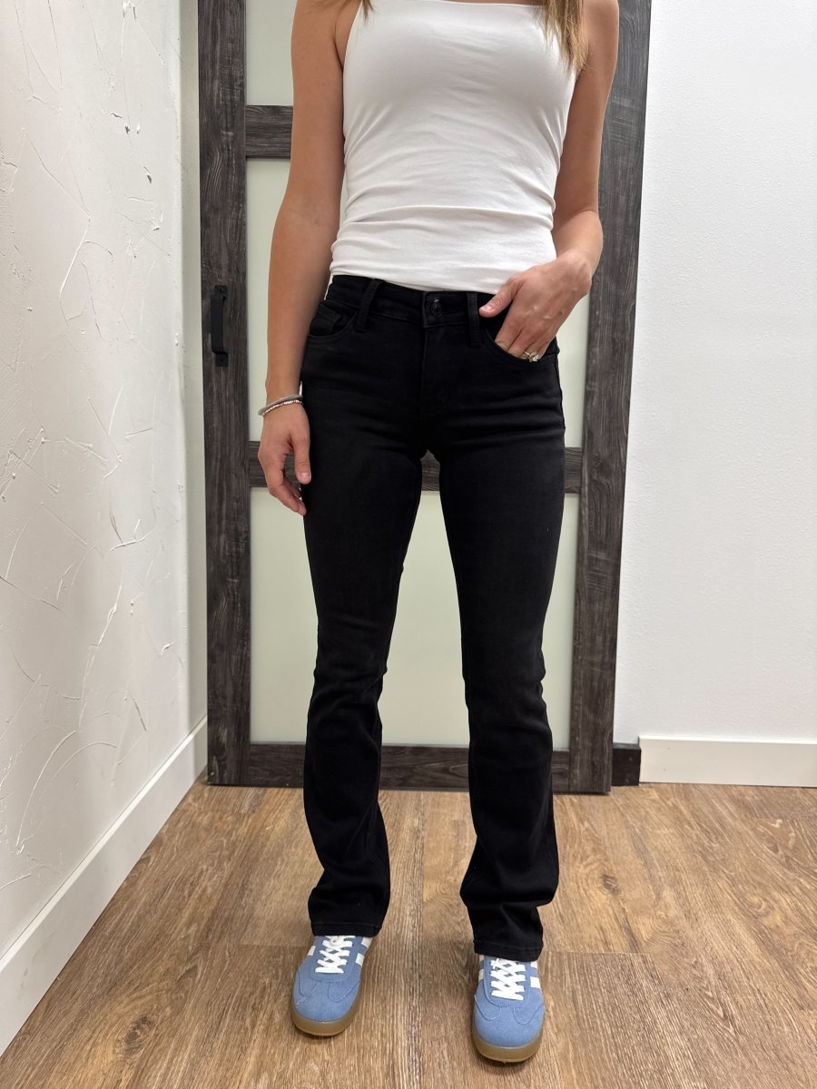Close up of denim fabric and mid rise waistband detail — Three:Twelve Boutique