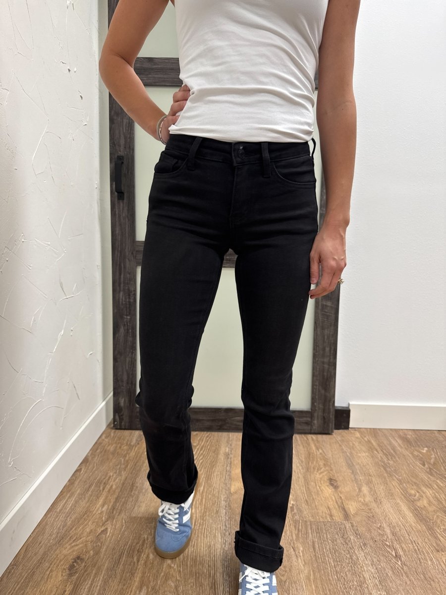 Lifestyle shot of model styled in Vervet denim jeans with casual top — Three:Twelve Boutique