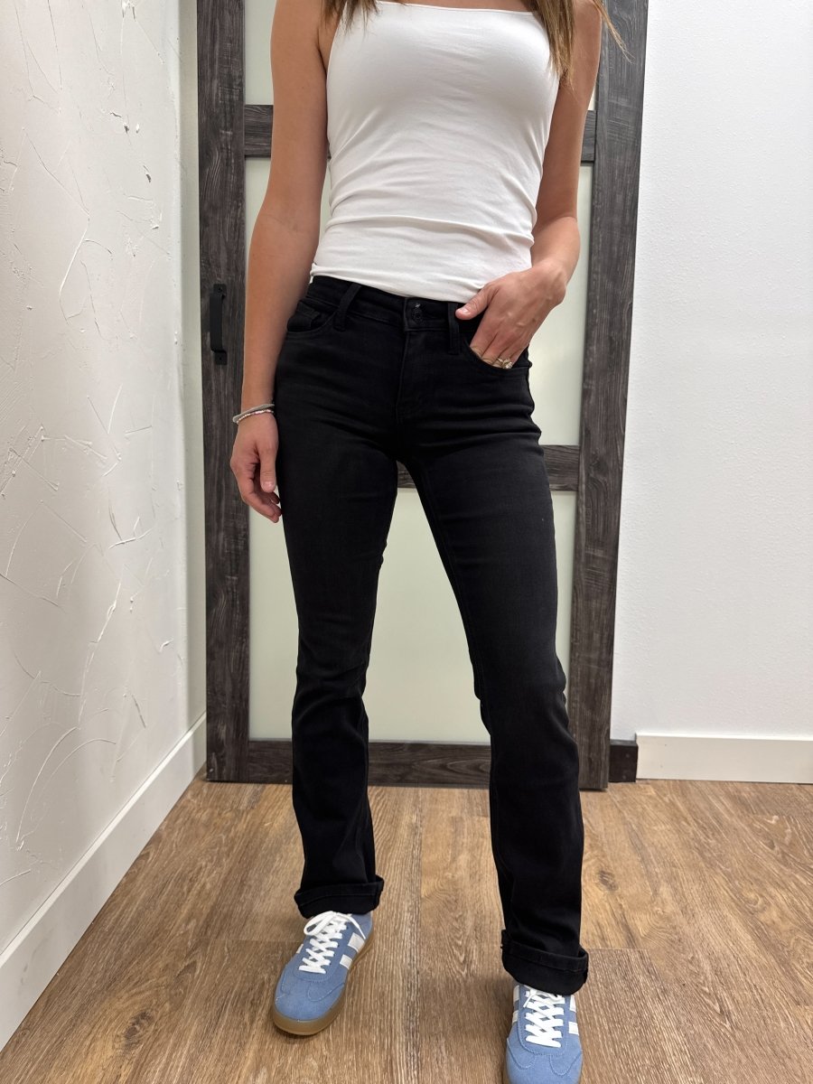 Lifestyle shot of model styled in Vervet denim jeans with casual top — Three:Twelve Boutique