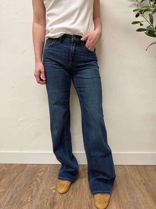 Front view of model wearing Flying Monkey mid rise wide leg jeans showing relaxed fit — Three:Twelve Boutique