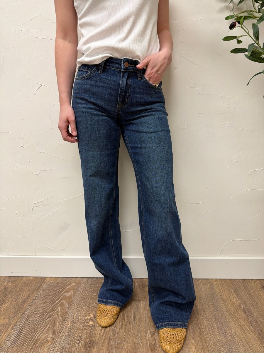 Front view of model wearing Flying Monkey mid rise wide leg jeans showing relaxed fit — Three:Twelve Boutique