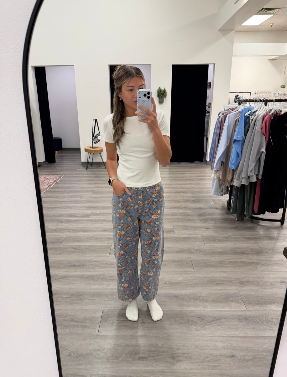 Front view of model wearing mineral washed floral denim barrel jeans — Three:Twelve Boutique