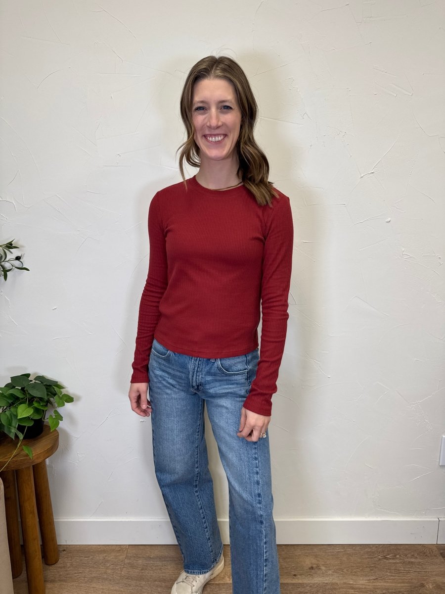 Lifestyle shot of Minnie long sleeve styled with denim — Three:Twelve Boutique