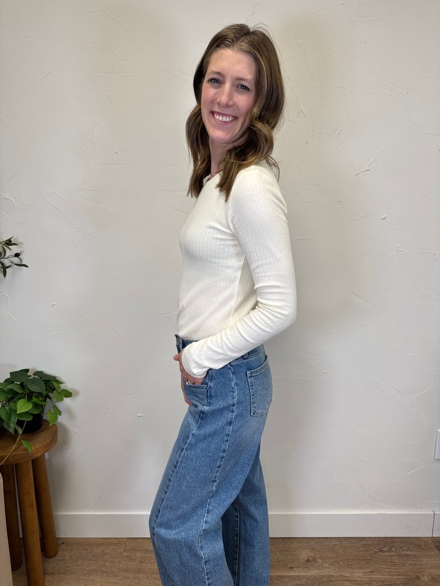 Side view of fitted Minnie long sleeve top on model — Three:Twelve Boutique

