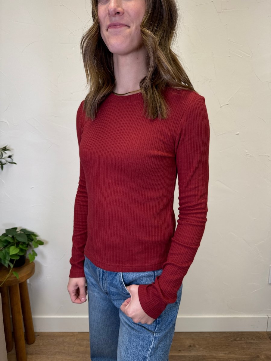 Side view of fitted Minnie long sleeve top on model — Three:Twelve Boutique