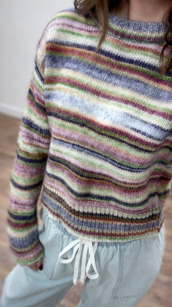 Close up of knit texture and stripe pattern detail on Mix Stripe Crop Sweater — Three:Twelve Boutique