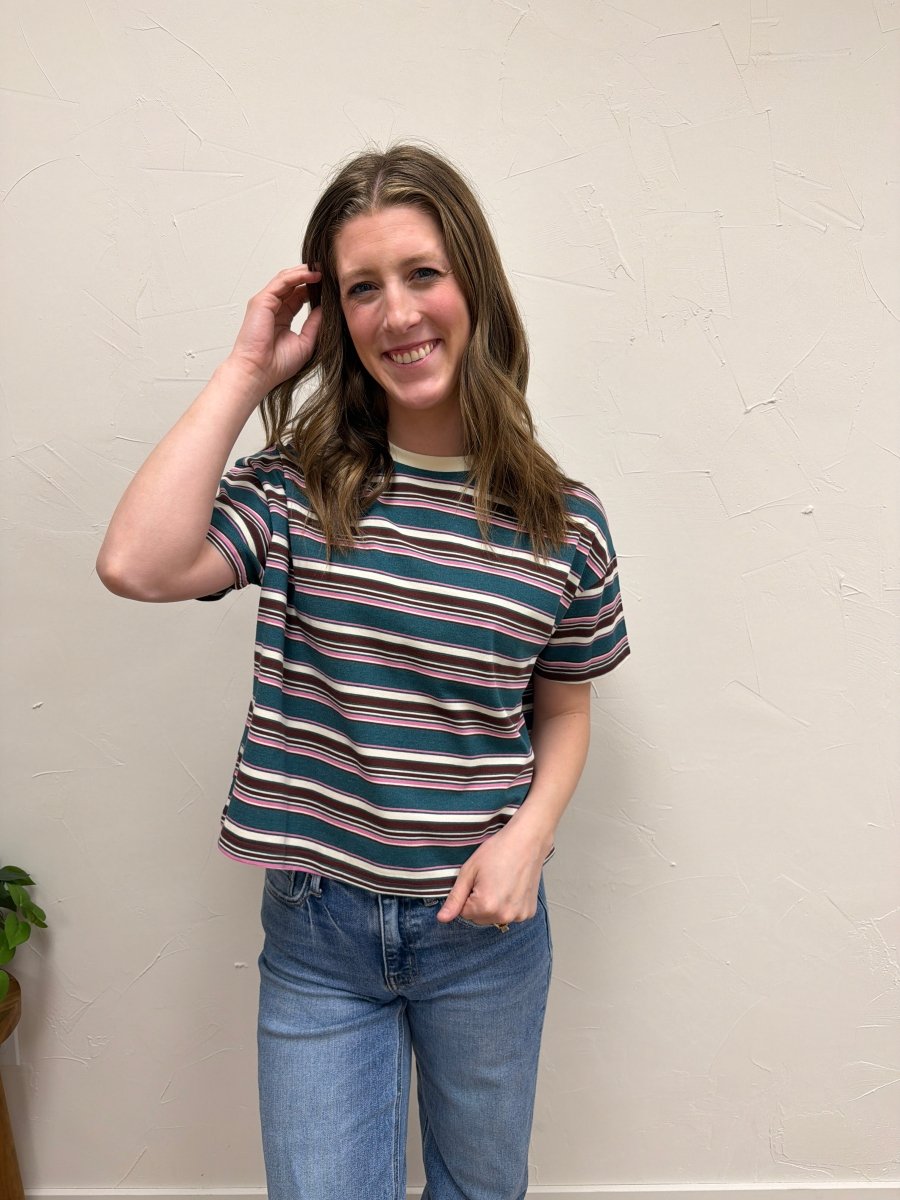 Lifestyle shot of model wearing striped tee styled with casual denim outfit — Three:Twelve Boutique