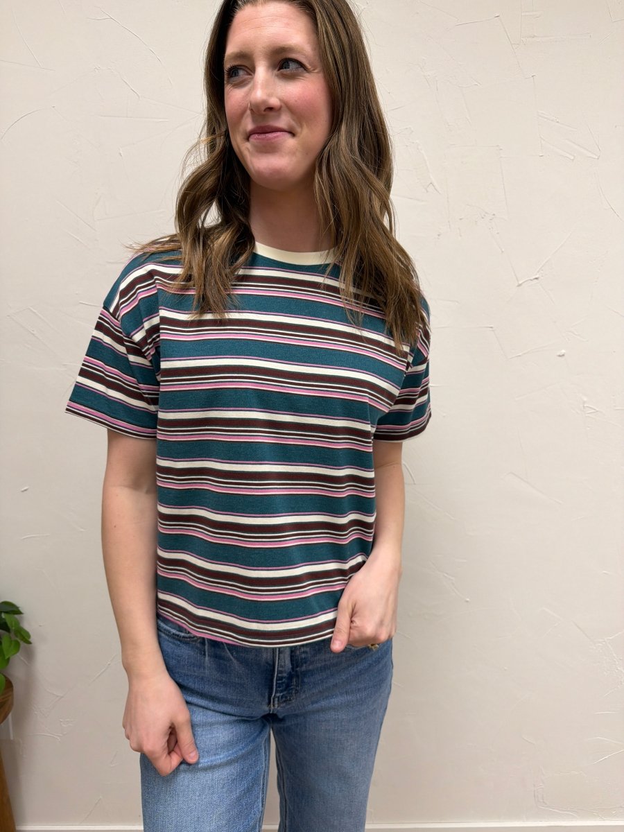 Lifestyle shot of model wearing striped tee styled with casual denim outfit — Three:Twelve Boutique
