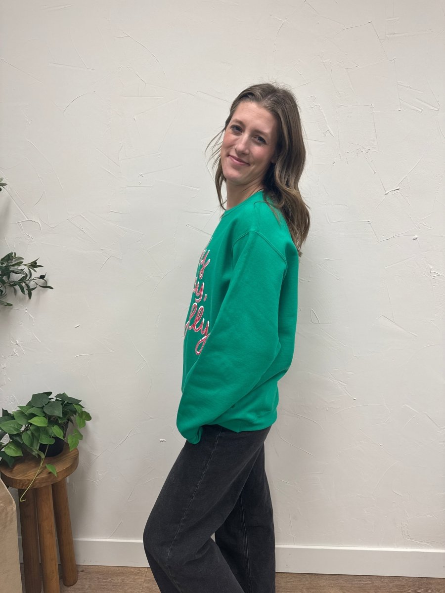 Side angle view of holiday sweatshirt showing relaxed sleeve and fit — Three:Twelve Boutique